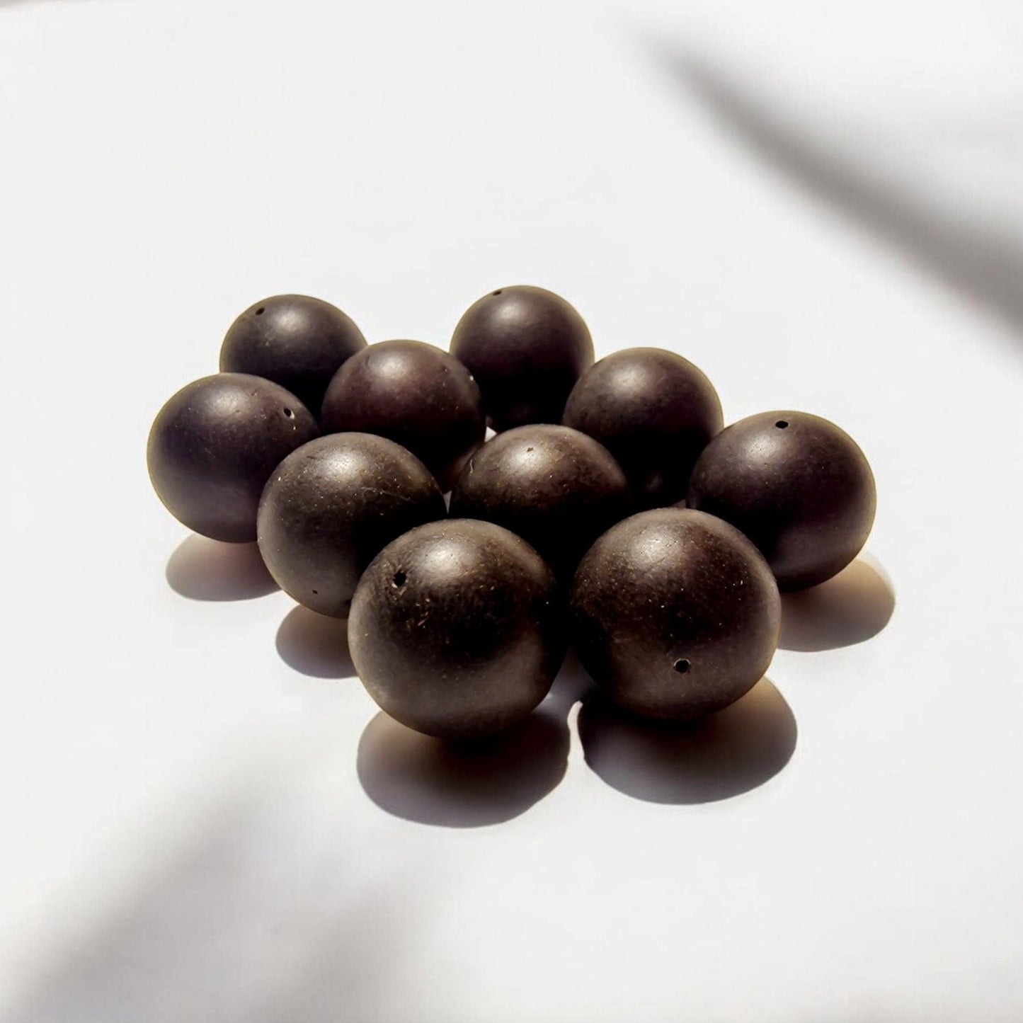 Raw Black Baltic Amber Beads: Round Pressed Loose Beads (18-21mm)