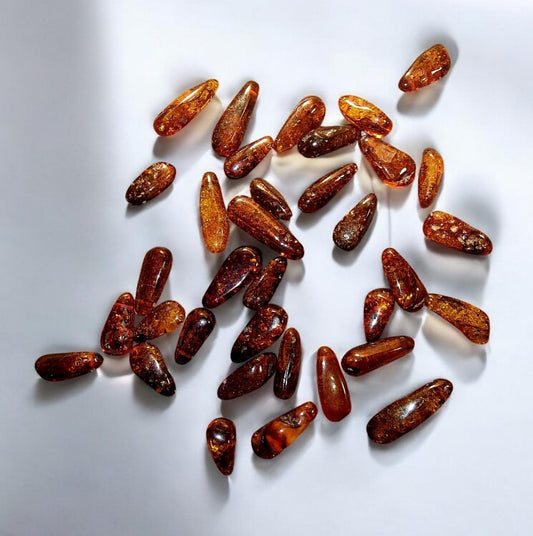 Polished Cognac Baltic Amber Beads: Olive Shape, Top Drilled (33pcs)