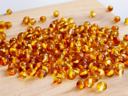 Polished Baltic Amber Beads: Honey Baroque Gemstones (5-6mm)