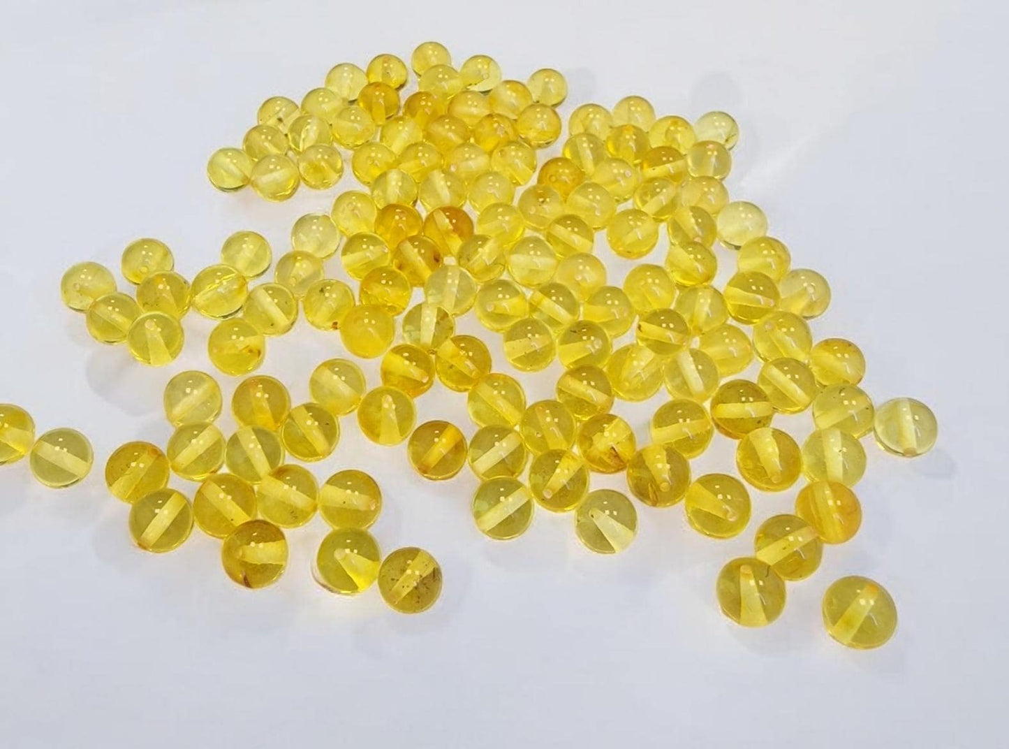 Polished Lemon Baltic Amber Beads: Round Jewelry Supplies (7-7.5mm, 10pcs)